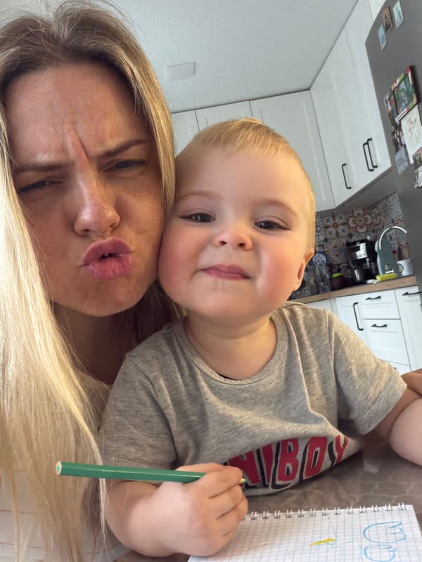 Mother and toddler share lunch, playtime in Votkinsk home