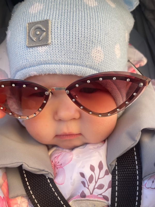 Baby in blue hat spotted in stroller in Chaikovsky