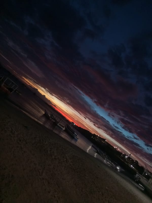 Dramatic twilight clouds captured at Juan Griego beach