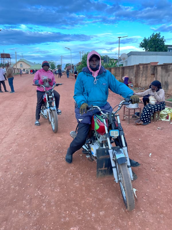 Street life documented across Nigerian towns during afternoon hours