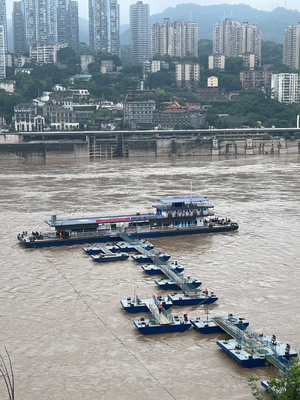Chongqing's Yuzhong District: river, skyline, and Raffles City