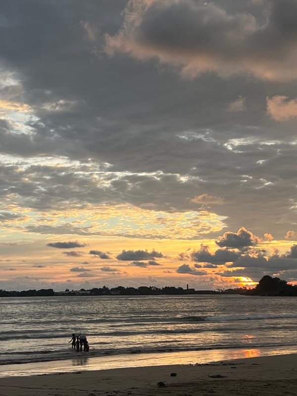 Family enjoys sunset moment on Galle beach