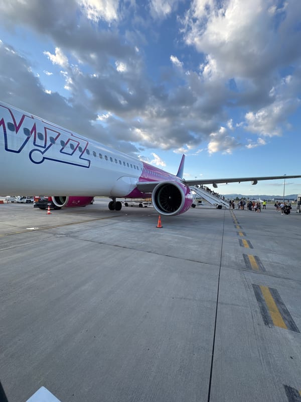 Wizz Air aircraft on the ground at Sofia Airport at sunset