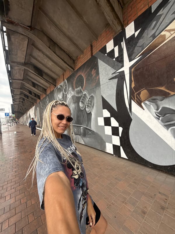 Touring a large outdoor mural wall in Rusanovo, Russia