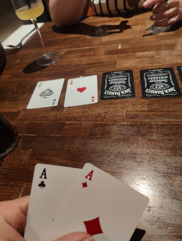 Card game session documented in East Suffolk evening