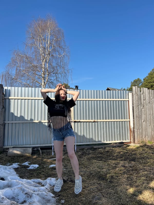 Woman photographed outdoors in Rusalevka, Russia during spring morning