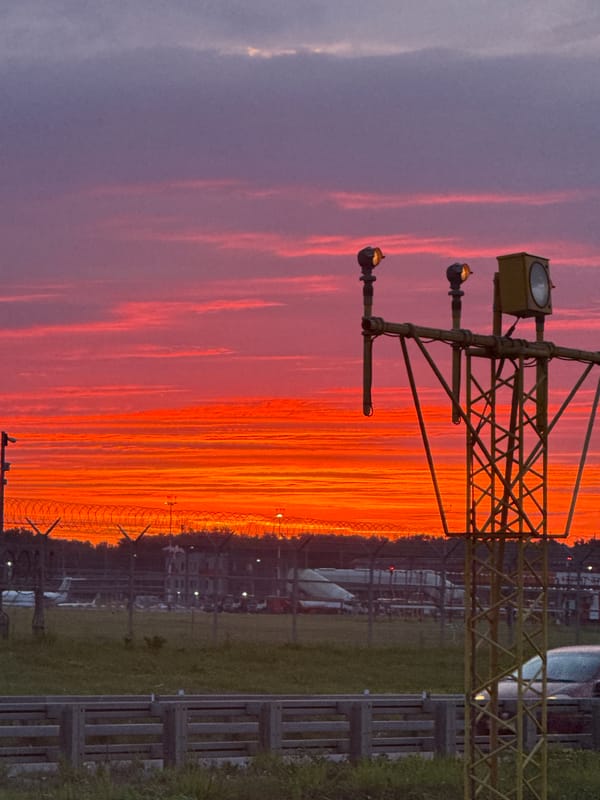 Planes and sunset at Sheremetyevo's edge, golden hour