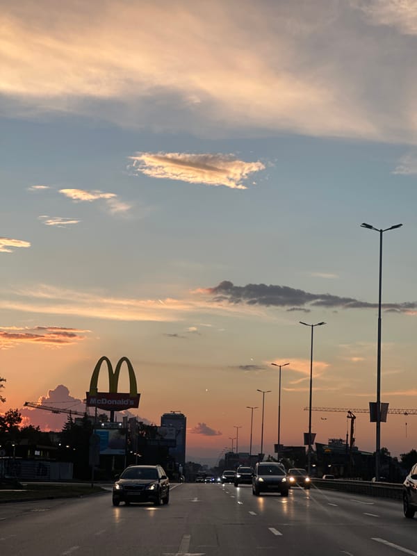 Sofia streets glow under a vivid summer sunset