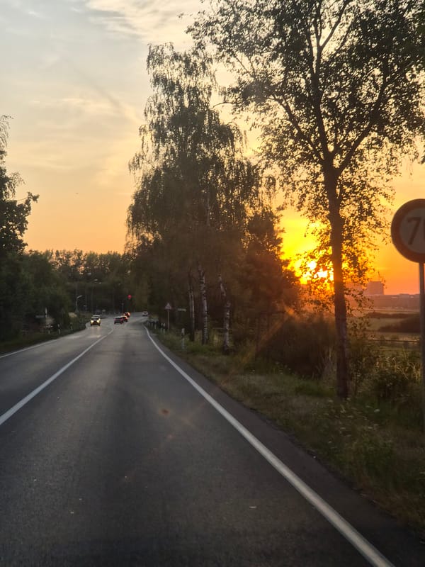 Golden sunset over winding roads near Luxembourg City