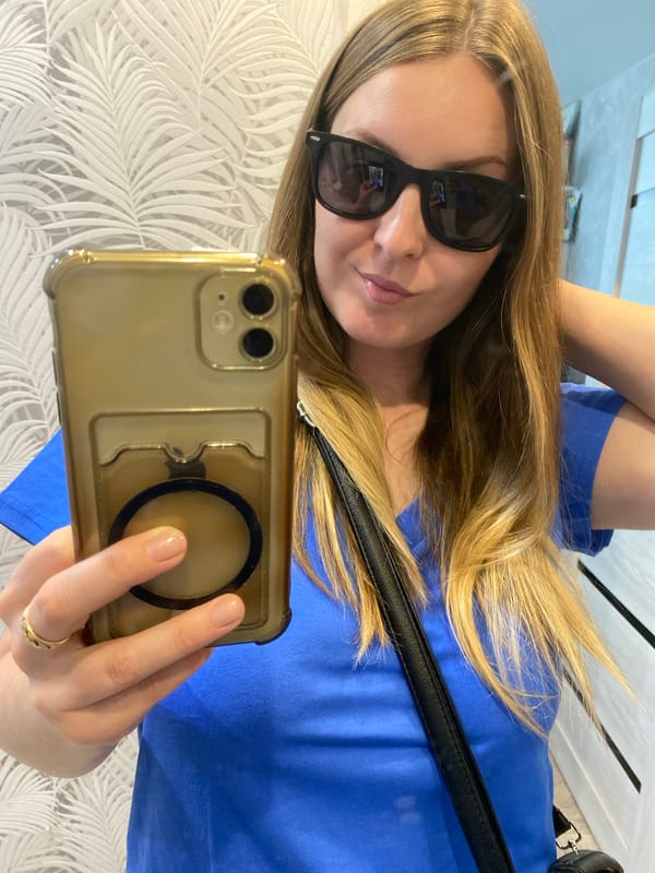Woman takes selfies in apartment in Noviy, Russia