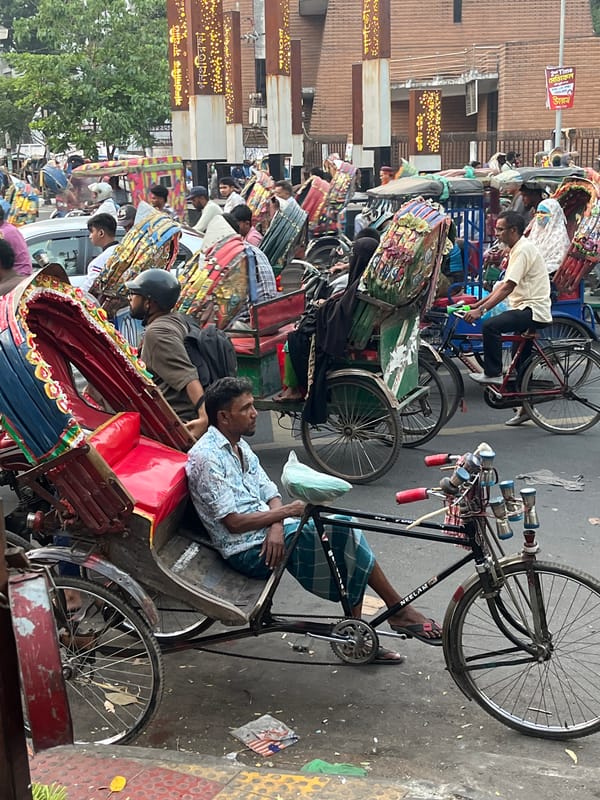 Routine traffic activity captured at busy Dhaka intersection