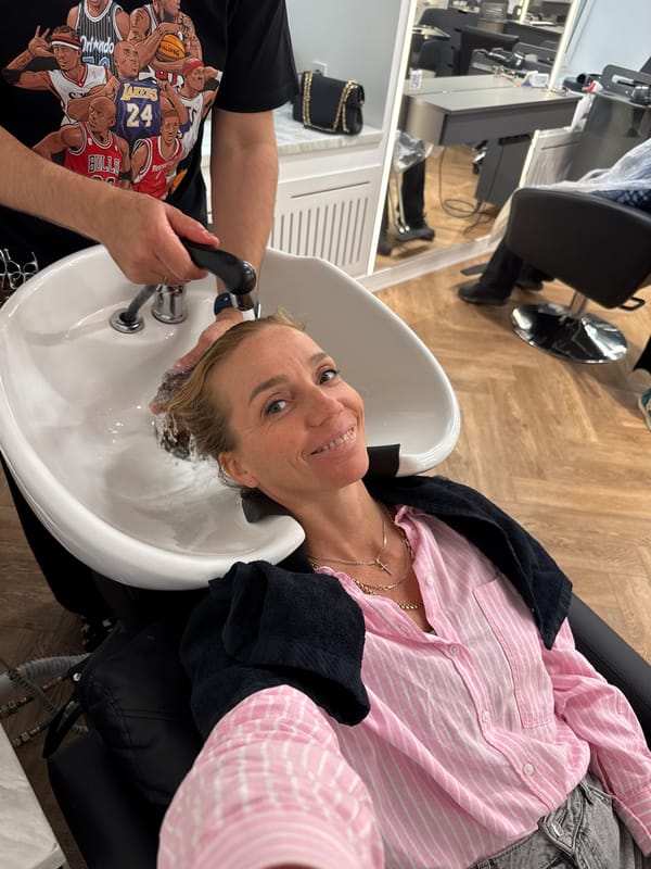 Woman receives hair salon services in Saint Petersburg