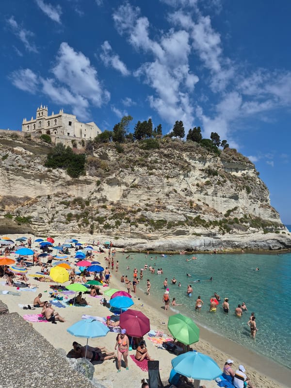 Tropea's beach and clifftop sanctuary on a sunny morning