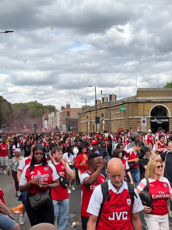 Arsenal fans gather in London streets