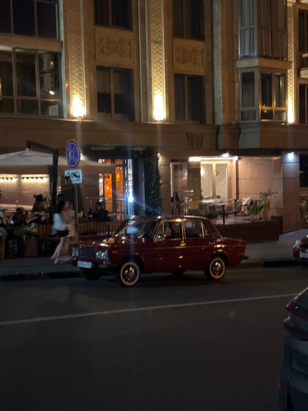 Kazan bar night, vintage car outside and bottle chandelier within