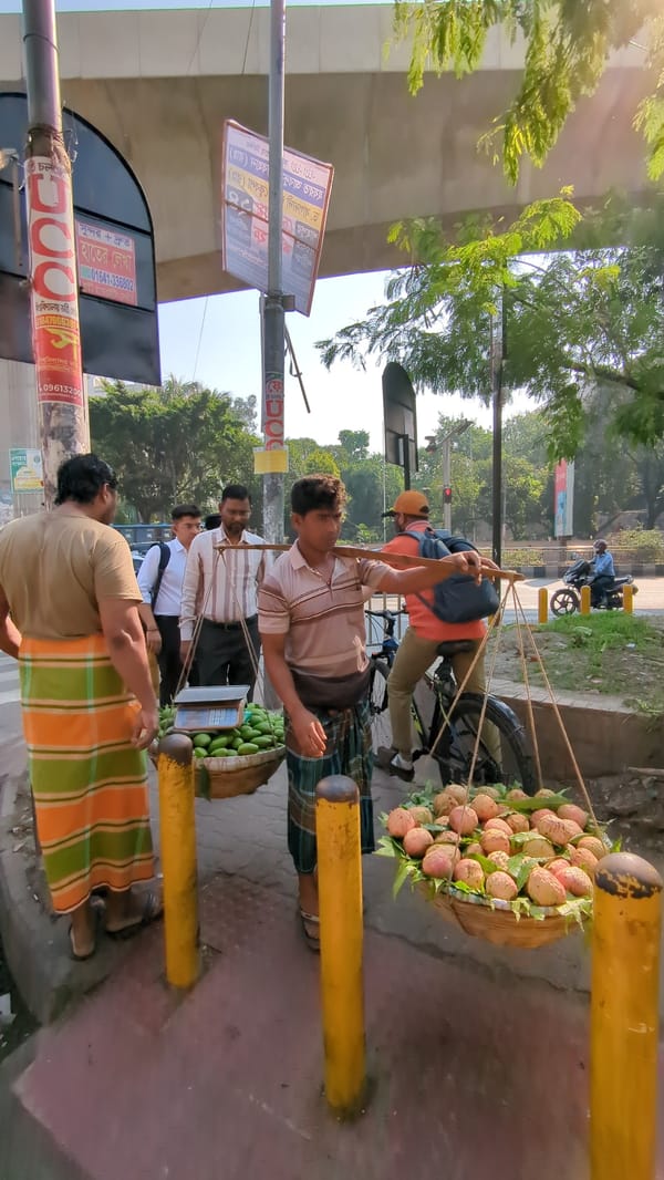 Early morning street life documented in central Dhaka
