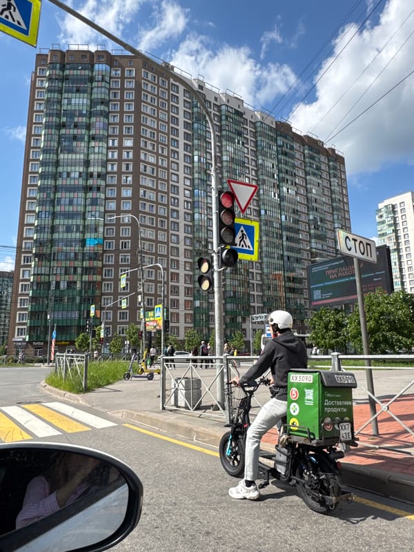 Witness documents modern high-rise building in Murino, Russia