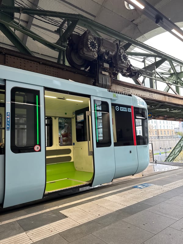Wuppertal suspension train carries passengers through German station