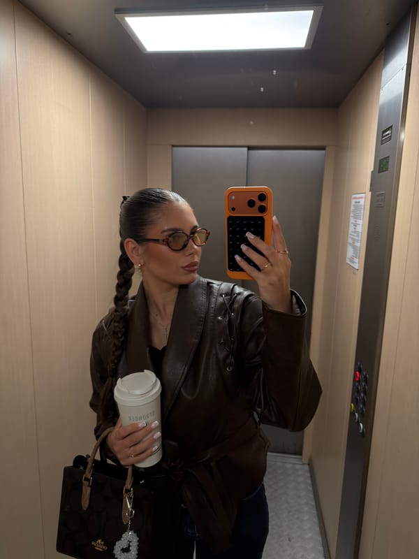 Woman Takes Morning Elevator Selfie in Krasnoyarsk