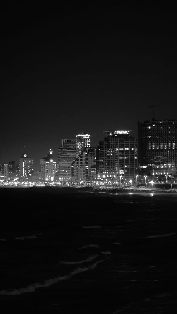 Tel Aviv after dark: coastline, harbor, and old city streets