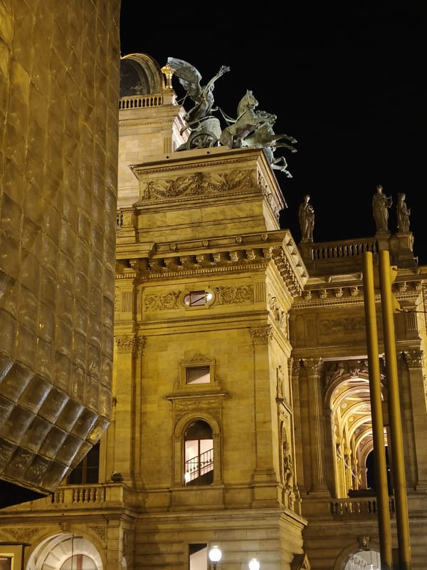 Prague National Theatre district captured in nighttime street scenes