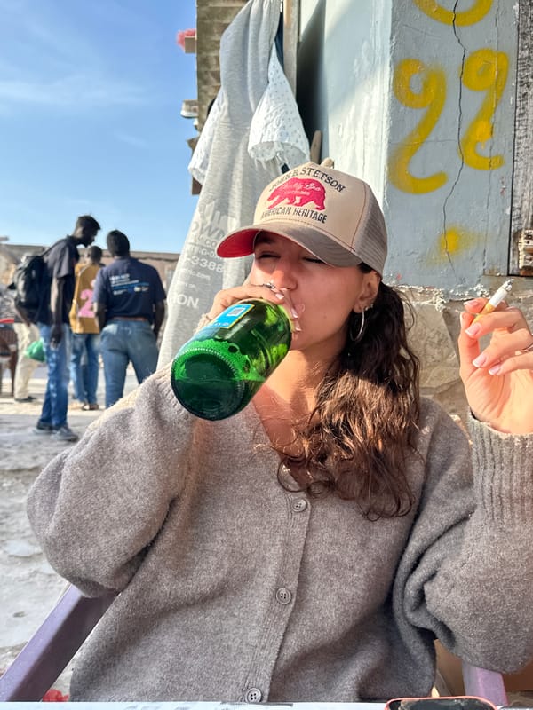 Woman photographed outdoors in Dakar on sunny day