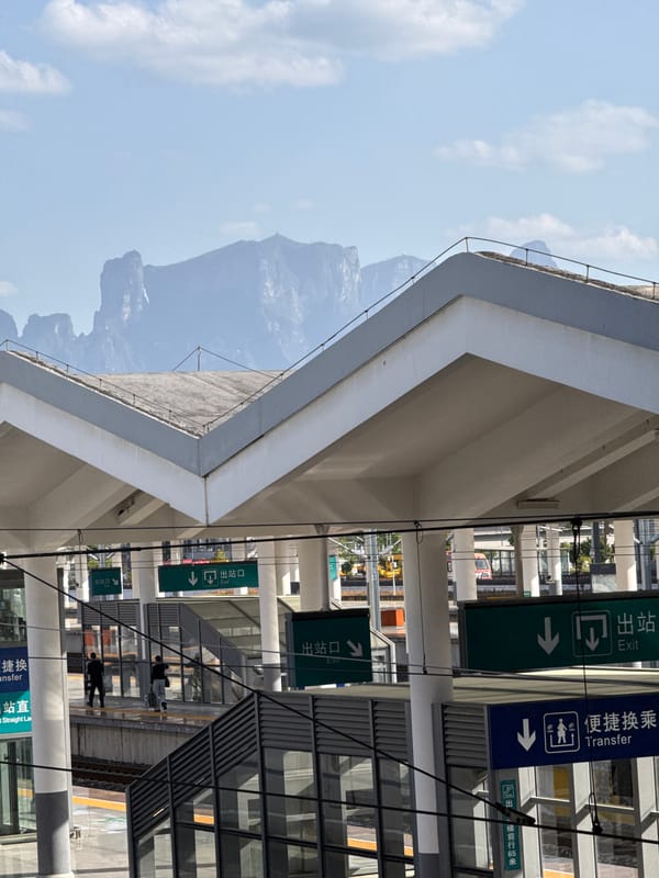 Modern transit station observed in Zhangjiajie against mountain backdrop