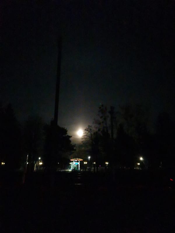 Bright moon illuminates nighttime scenes in Лосева, Belarus