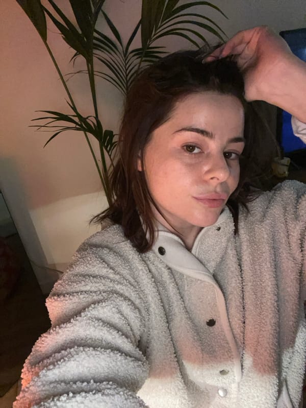 Couple documents evening routine together in Roubaix apartment