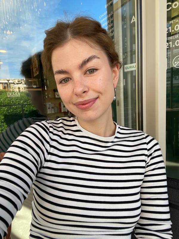 Woman shops, takes selfies during early morning in Budva