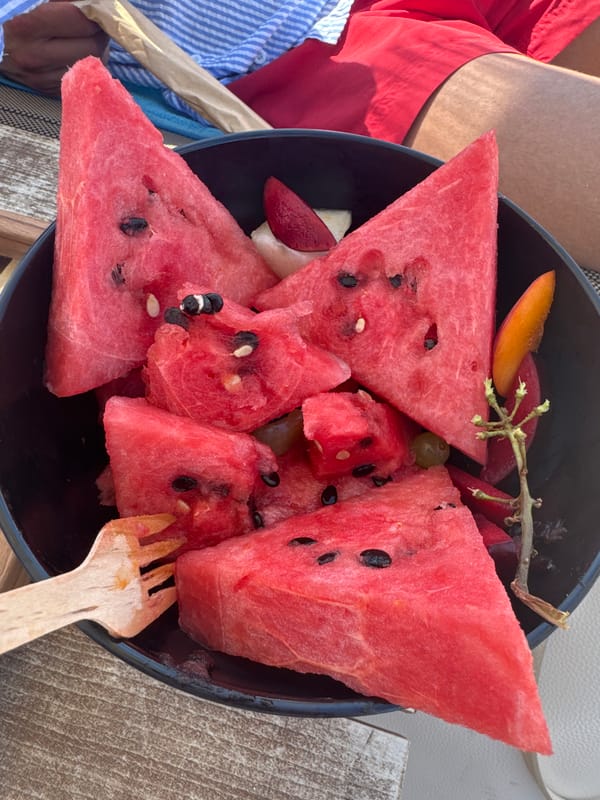 Lazy beach afternoon on the Aegean, pebbles and watermelon included