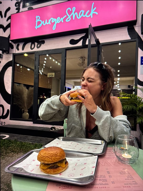 Woman spotted at Moscow shoreline and burger restaurant