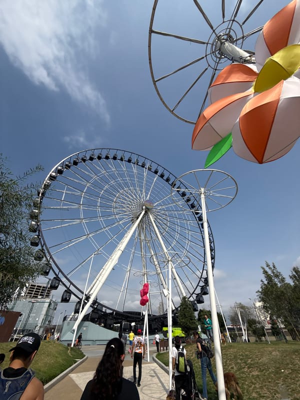 Weekend leisure activities captured near Puebla's iconic Ferris wheel