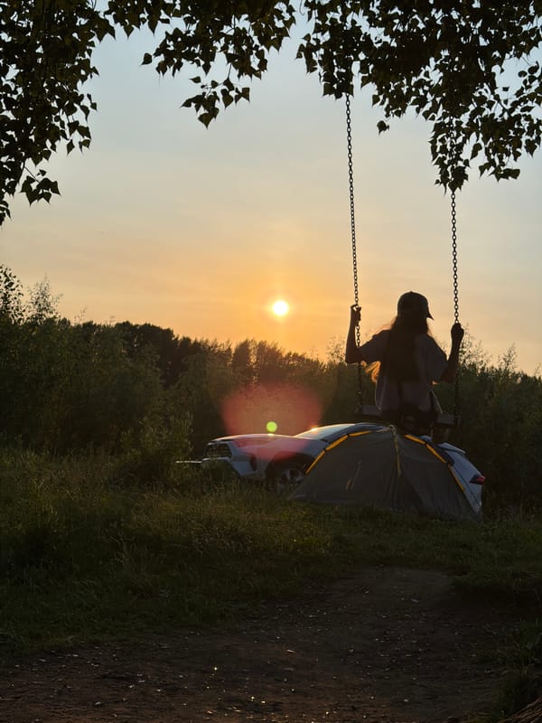 Swing, tent, and golden hour at a Chaikovsky outdoor hangout