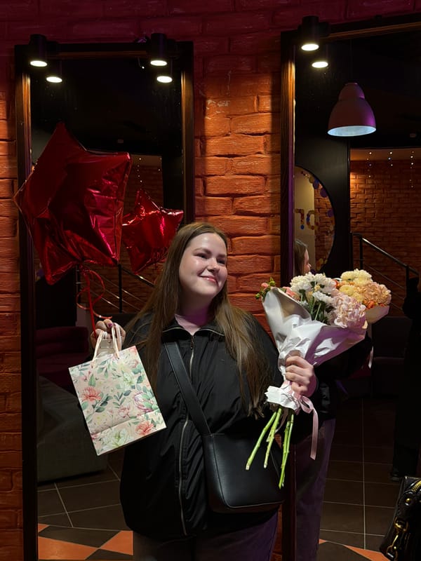 Woman celebrates with flowers, bowling in Izhevsk evening outing