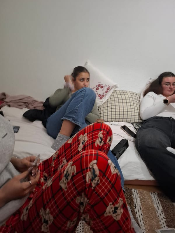 Friends play cards at home in Panagyurishte, Bulgaria