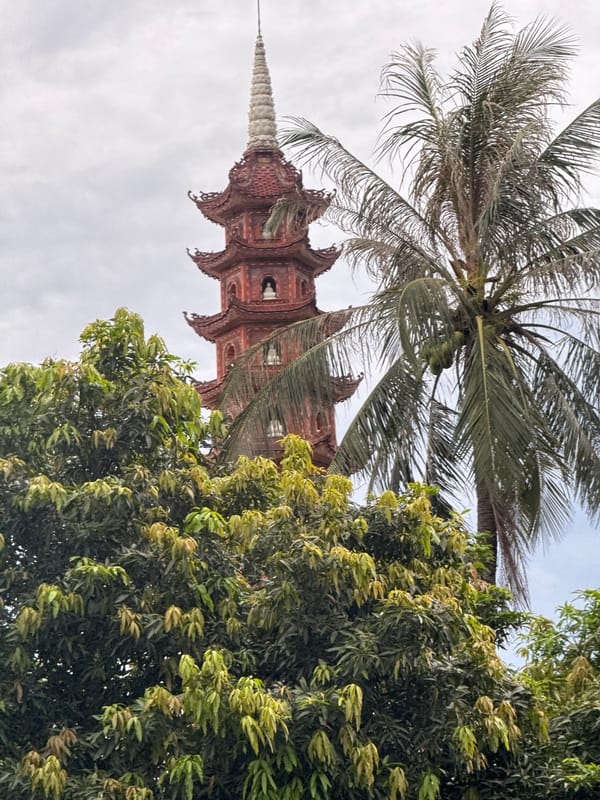 Street life, temples, and market scenes across central Hanoi
