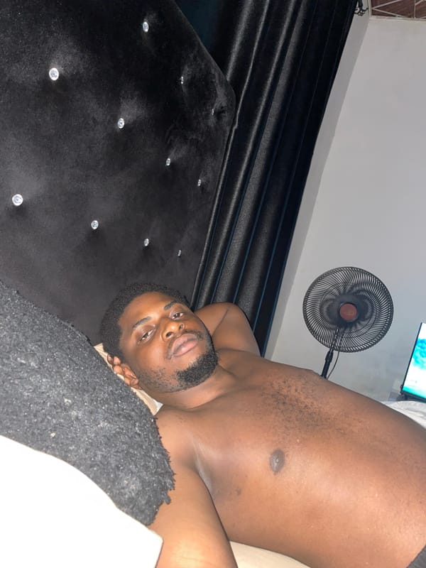 Man resting on bed in Akwanga, Nigeria