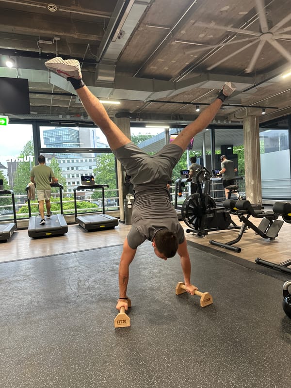 Gymnast performs handstand routine at Essen gym