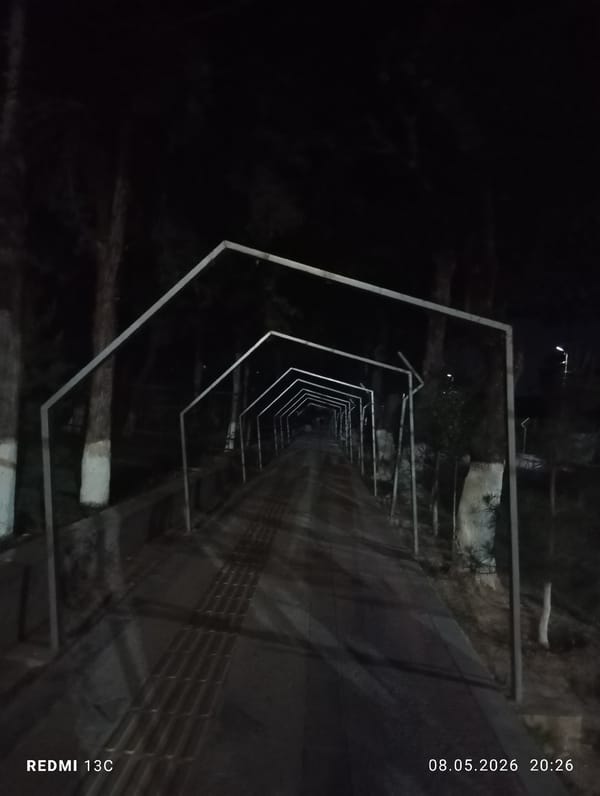 Empty night walkway documented in Gazalkent, Uzbekistan