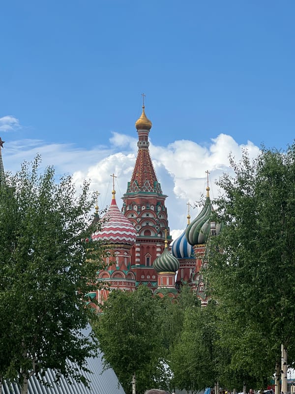 Tourist activity with doves captured at Moscow's Saint Basil's Cathedral