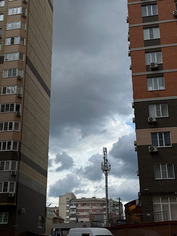 Overcast skies viewed between buildings in Rostov-on-Don