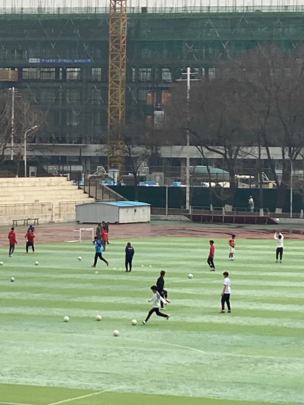 Soccer training session near construction site in Zhongtun
