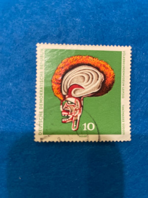 Eclectic postage stamp collection spread out in Perm