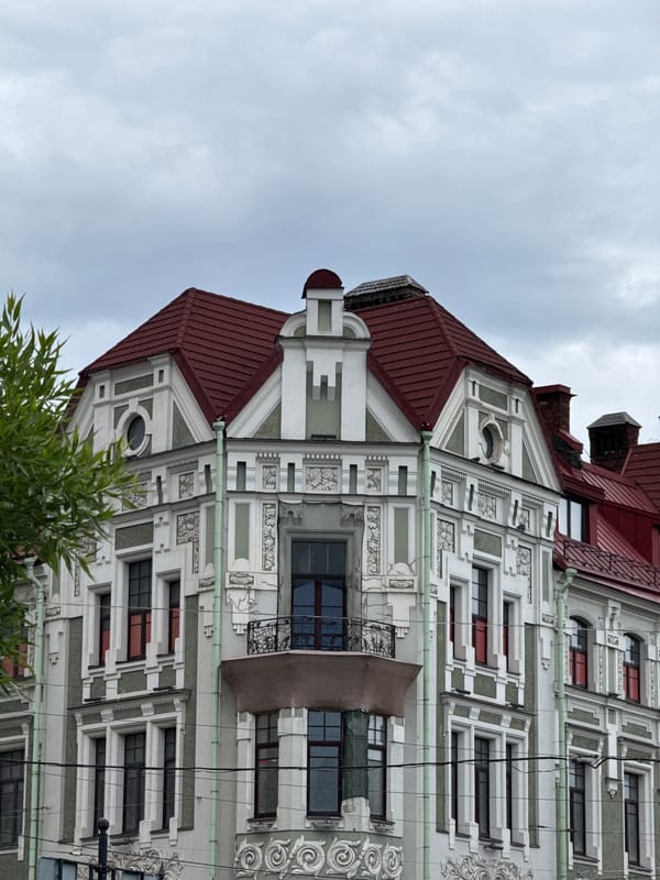 Witness documents ornate building architecture during morning hours