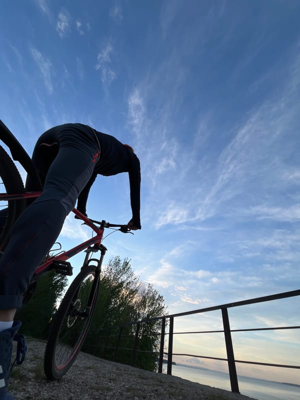 Cyclist spotted on red mountain bike in Chaikovsky, Russia