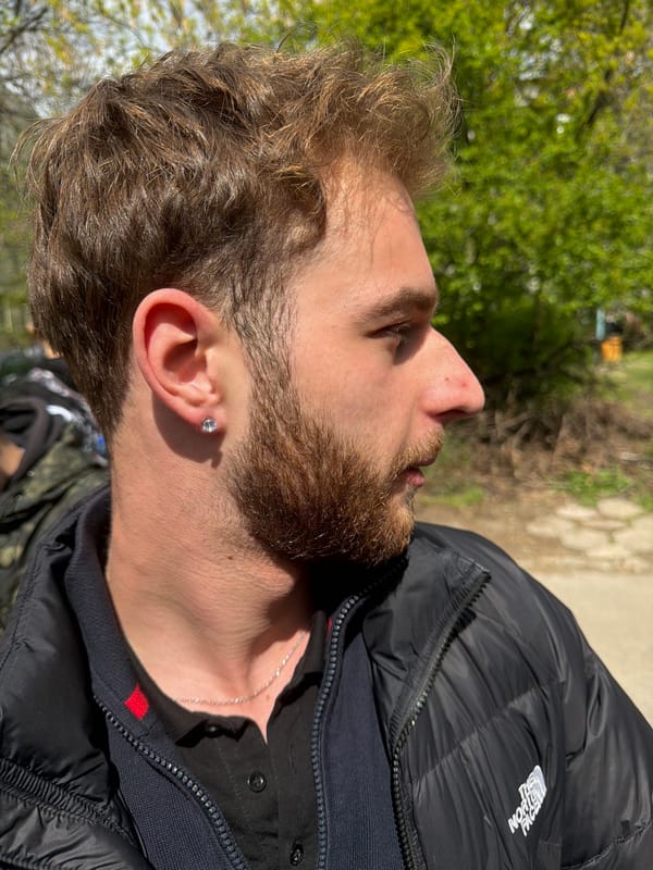 Young man photographed in profile outdoors in Sofia