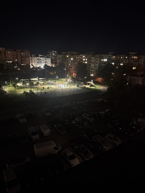 Nighttime aerial views of a residential neighborhood with a park