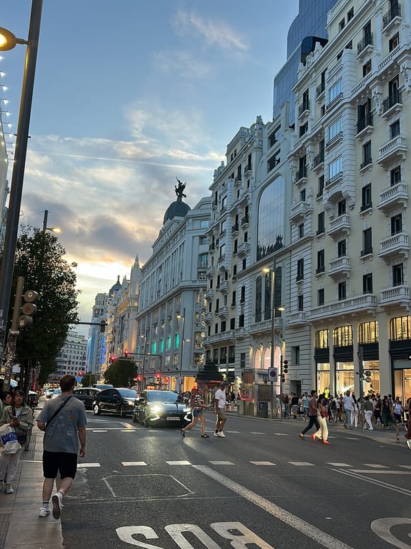 Evening street scenes captured from elevated Madrid thoroughfare