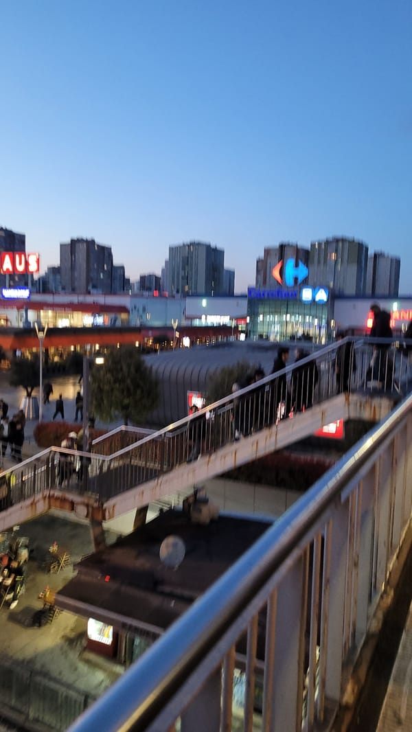 Evening shoppers and commuters navigate busy Esenyurt district